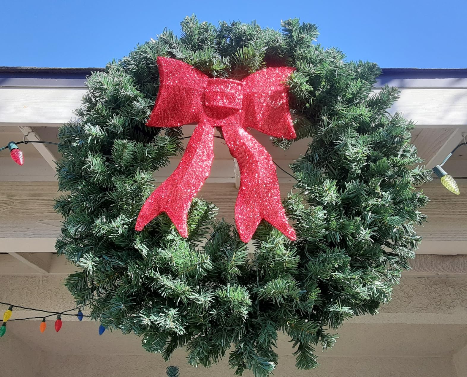 Best Choice Products 24in Large Artificial Pre-Lit Fir Christmas Wreath Holiday Accent Decoration for Door, Mantel w/Red Lighted Bow, 70 LED Lights, 100 PVC Tips, Battery Operated customer photo 2