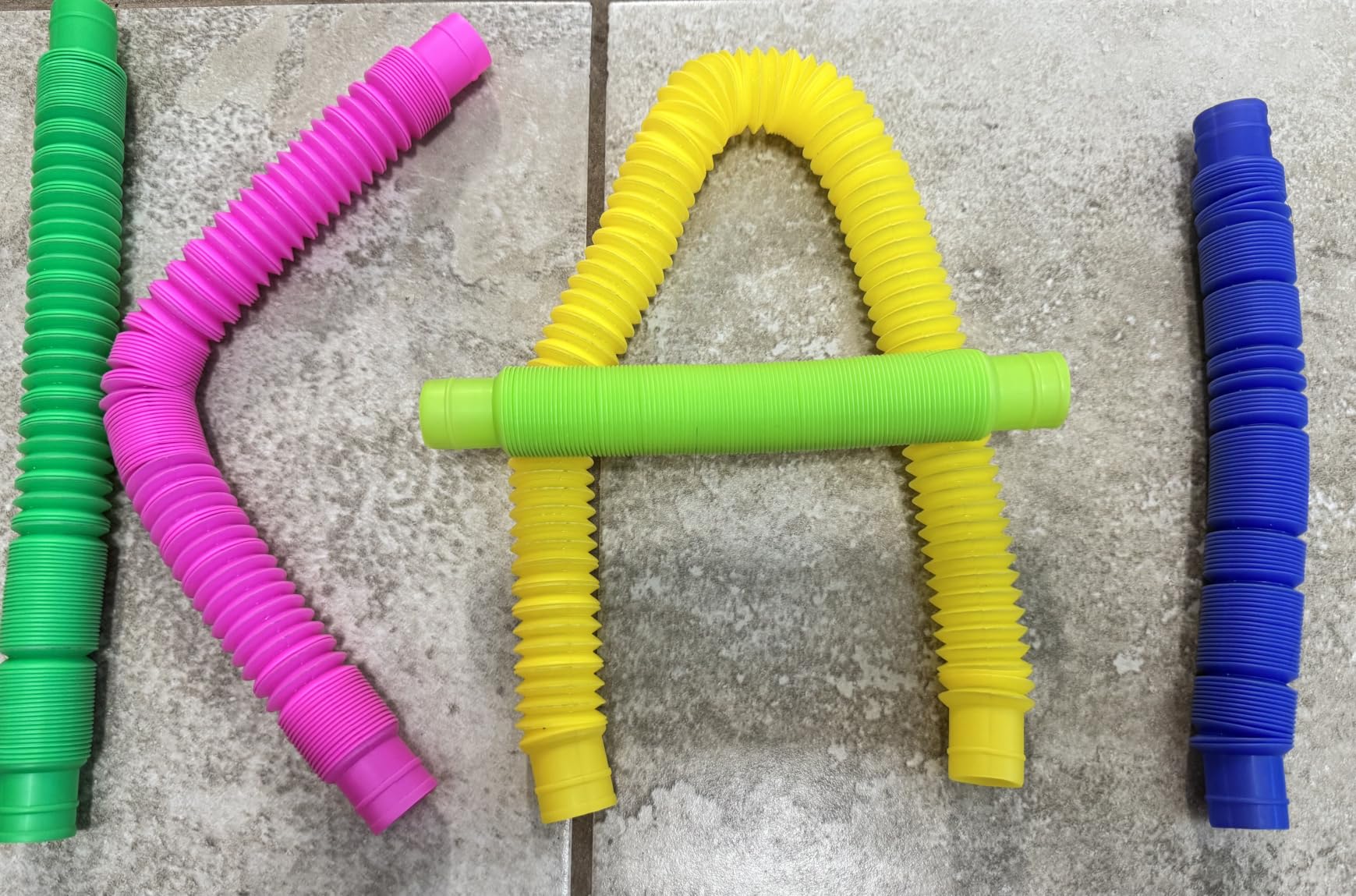 Nutty Toys Pop Tubes - Large 4-Pack Sensory Toys - Creative STEM Learning for Kids - Connect & Pop! Top ADHD Autism Fidget 2026, Best Boy & Girl Christmas Stocking Stuffers Gifts Idea customer photo 2