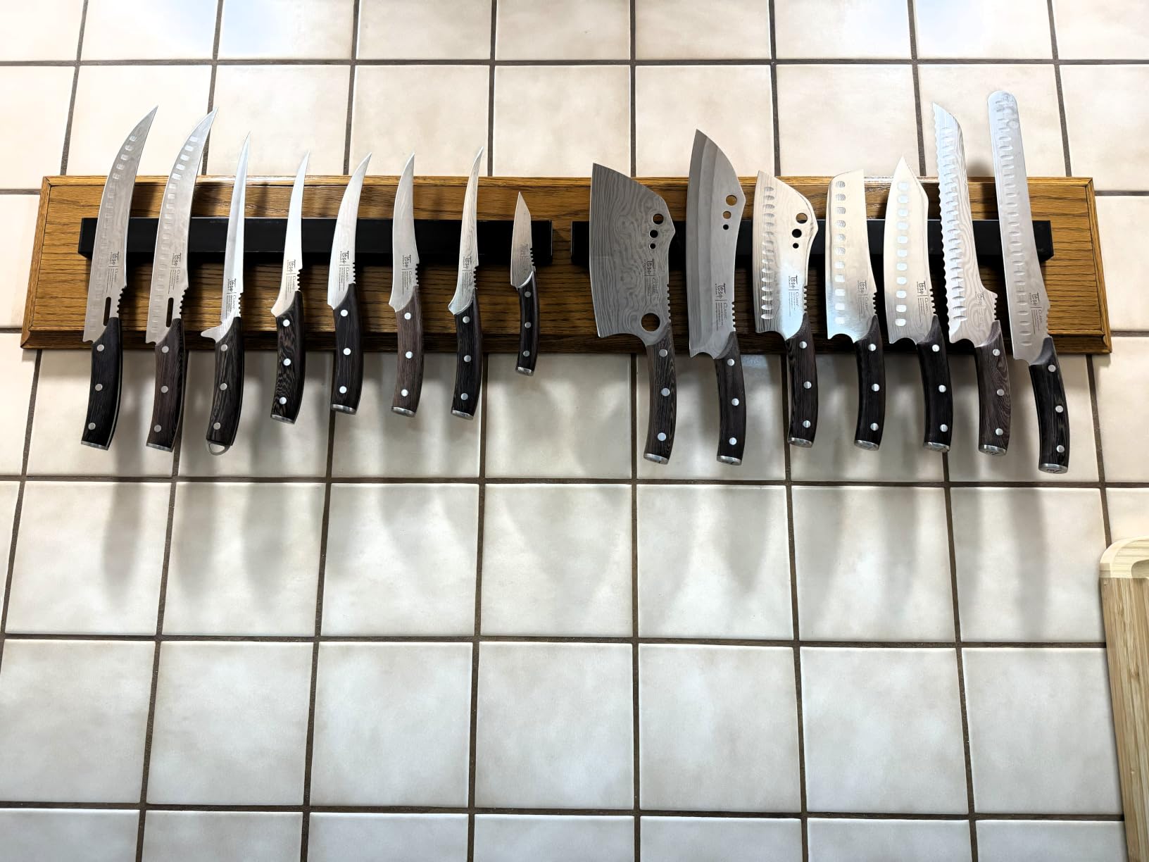 Dmore magnetic knife holder for wall—with 2 hooks, No Drilling 10 Inch black knife magnetic strip, Powerful knife magnet rack, include Adhesive Tape and screws for Knives, Utensils, and Tools customer photo 1