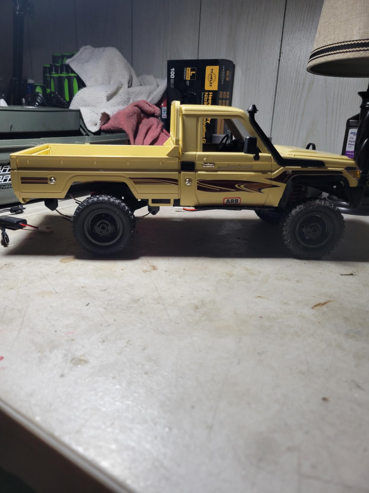 MN-82 RC Rock Crawler Car 1/12 Scale Toyota Pickup Truck , 2.4GHz 4WD Off-Road Remote Control Truck, 2-Speed Modes, 2×1200mAh Batteries, All-Terrain Crawler for Adults Kids Indoor Outdoor (whth Gift) customer photo 1