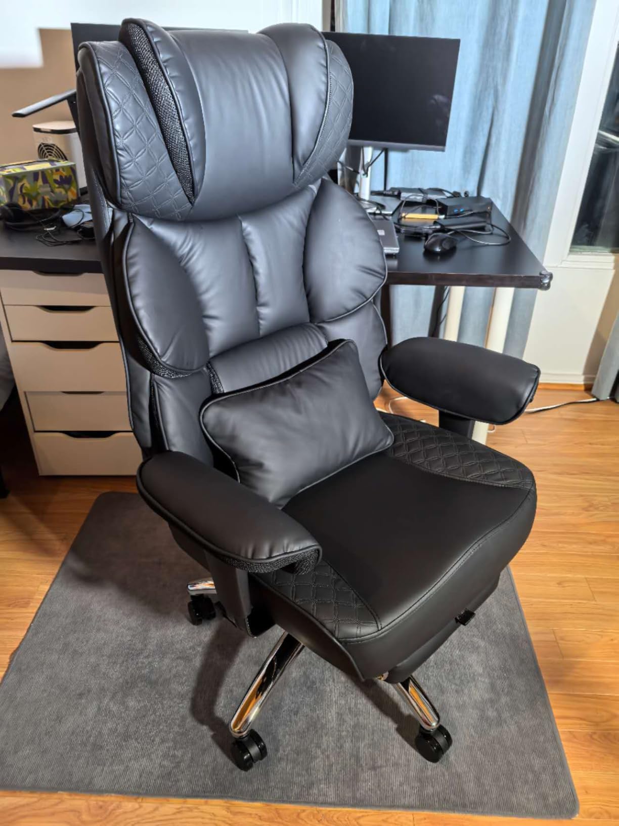 Office Desk Chair, Big and Tall Leather Gaming Chair with Footrest, Wide Ergonomic Comfy Executive High-Back Reclining Computer Chairs, Swivel Rolling Wheels and Padded Lumbar Support, Black Updated customer photo 1